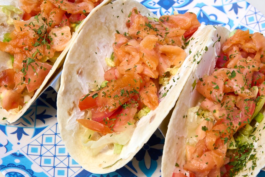 Quick smoked salmon tacos with avocado and cabbage